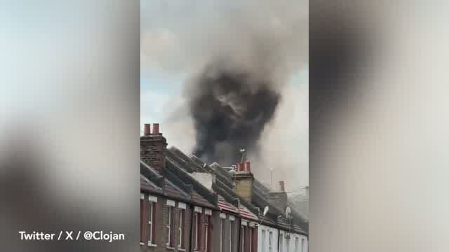 Hounslow fire: Smoke billows into sky as fire crews tackle house blaze ...