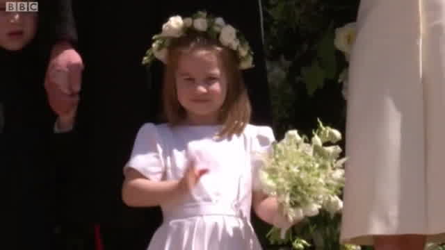 Royal Wedding: Princess Charlotte waves to the newlyweds Royal Wedding: Princess Charlotte waves to the newlyweds