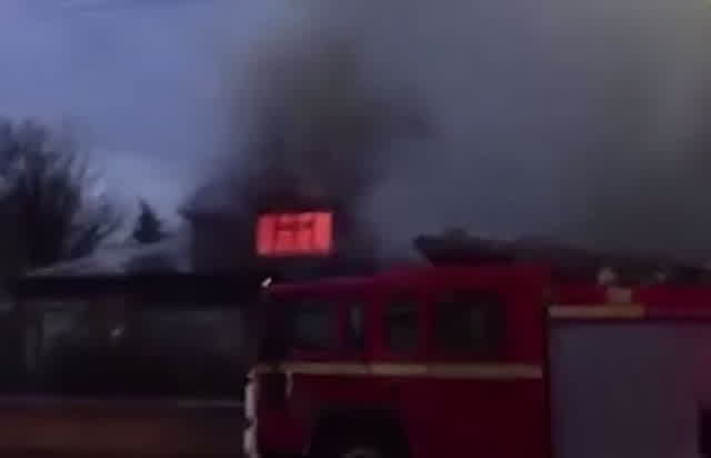Major road closed as fire crews tackle large blaze at derelict Salford ...