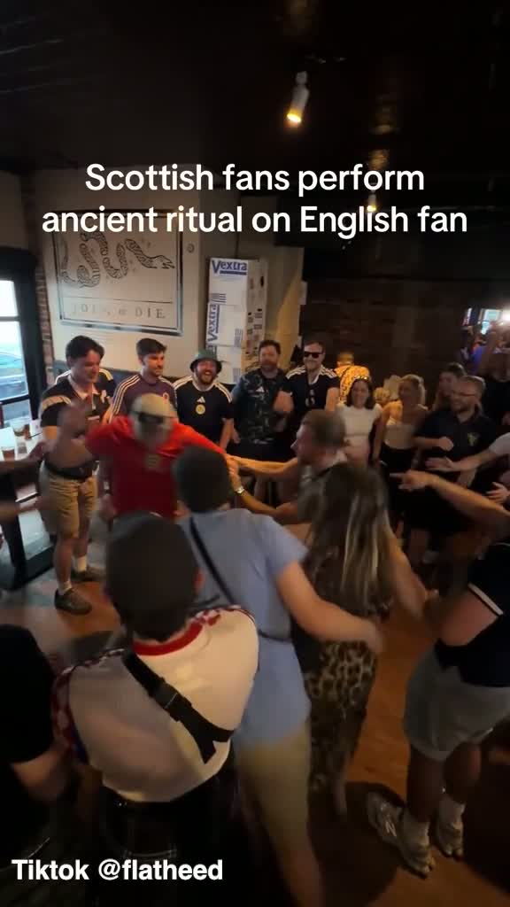 Scotland Fans Perform 'Ancient Ritual' on England Fan in Boston Pub