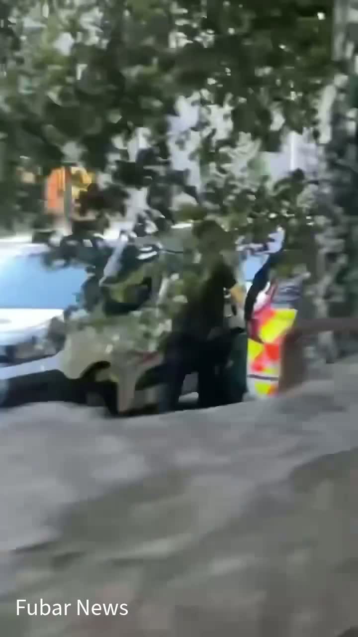 Armed cops swoop on Aberdeen flats after 'man seen with weapon' as pair arrested