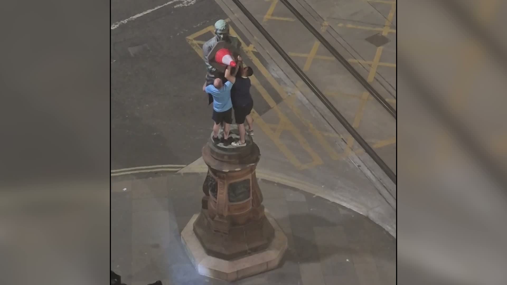 Man Falls 15ft Trying to Place Cone on Edinburgh Robert Burns Statue