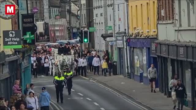 Watch as M9 crash teen laid to rest in gold casket and white horse-drawn hearse