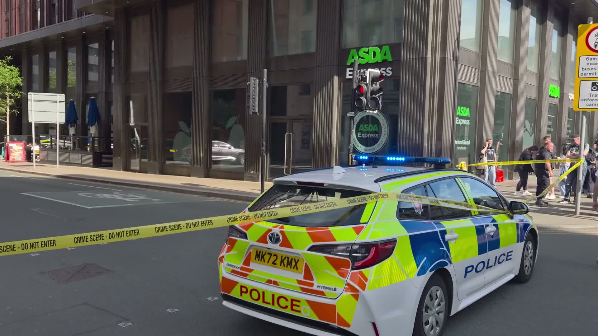 Manchester city centre horror as man dies after falling from hotel with ...
