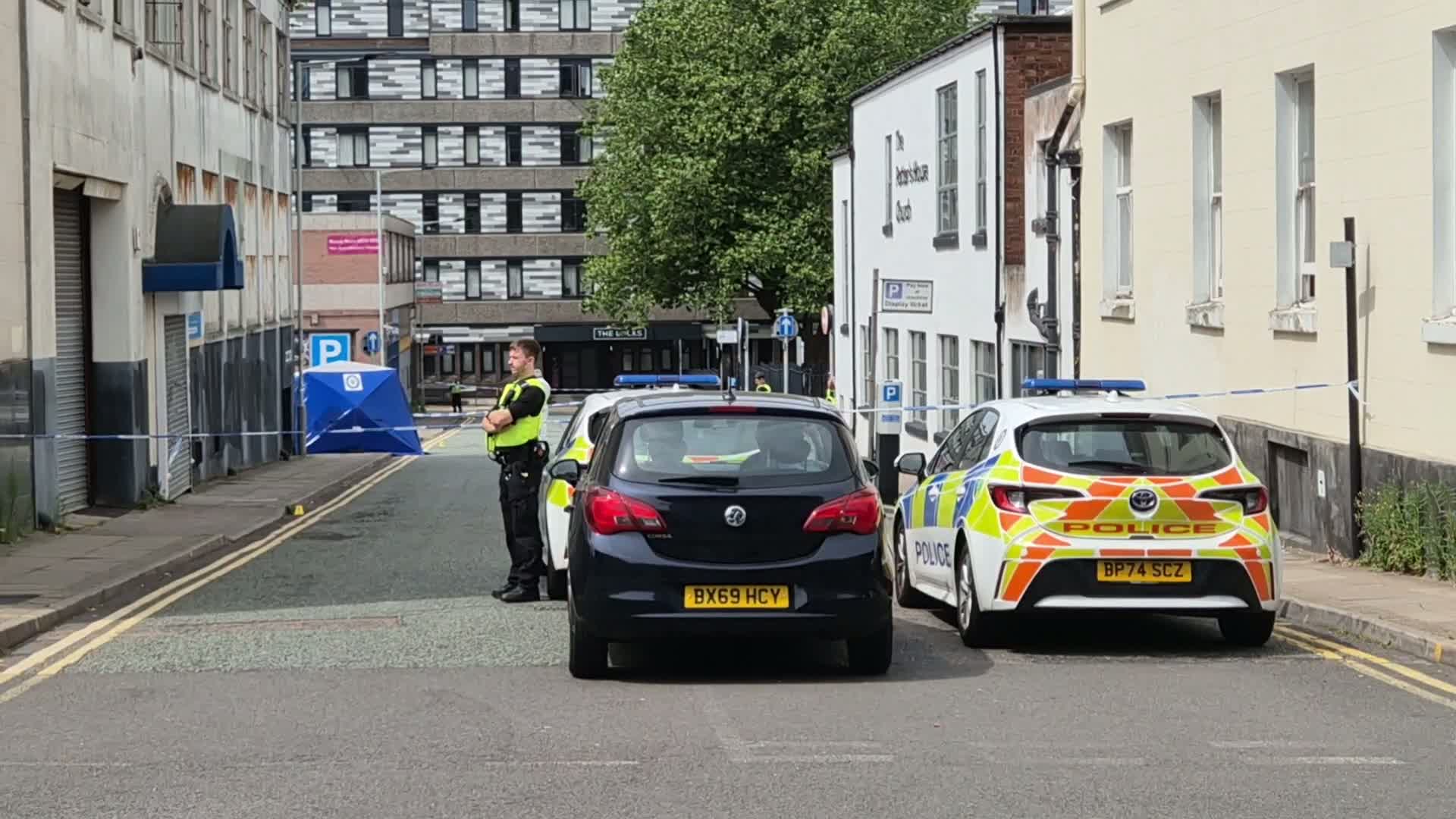 Tributes left at fatal stabbing scene in Wolverhampton, three arrested
