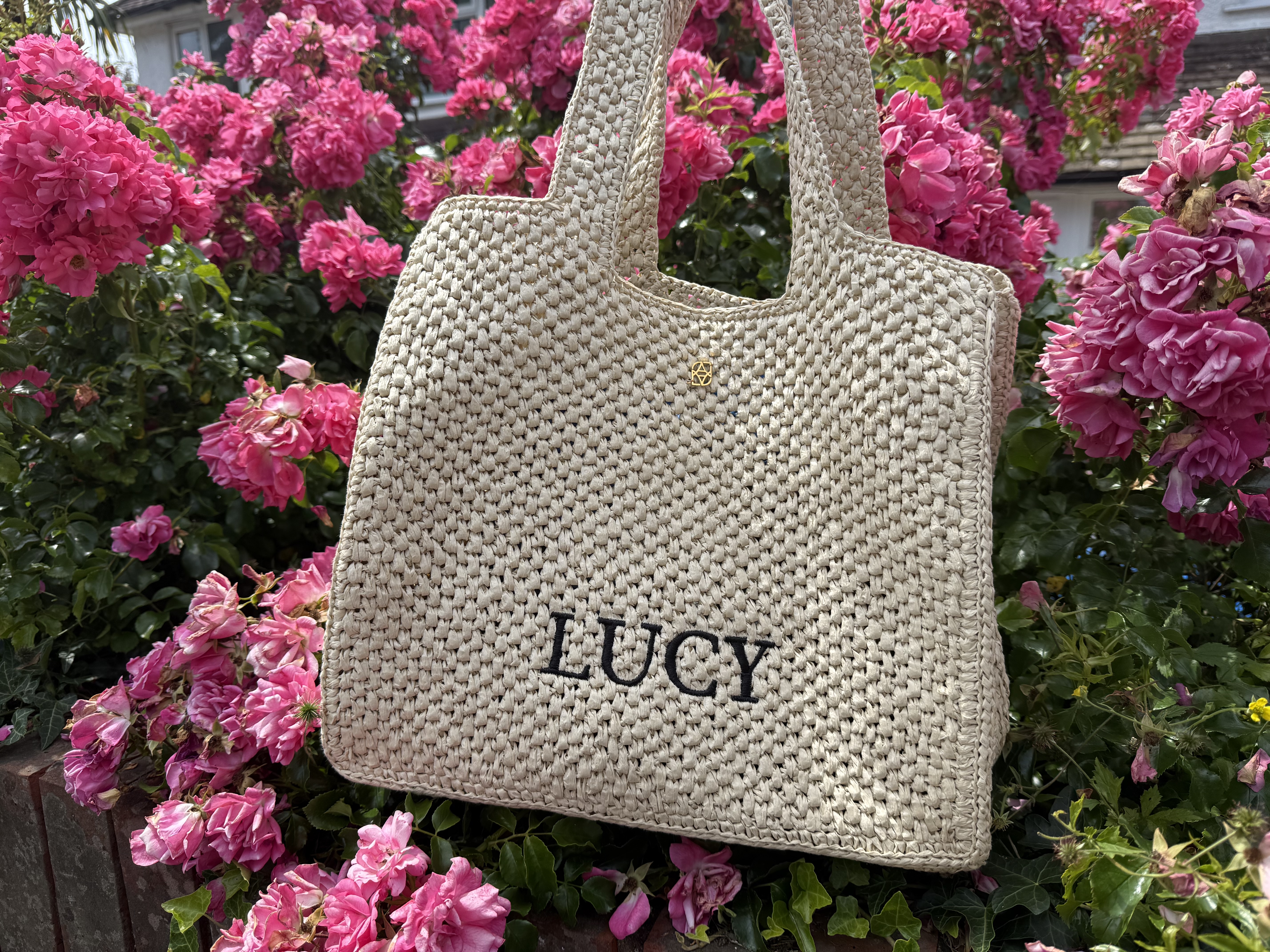 Olivia Attwood's Abbott Lyon Raffia Bag Review: Perfect Holiday Accessory