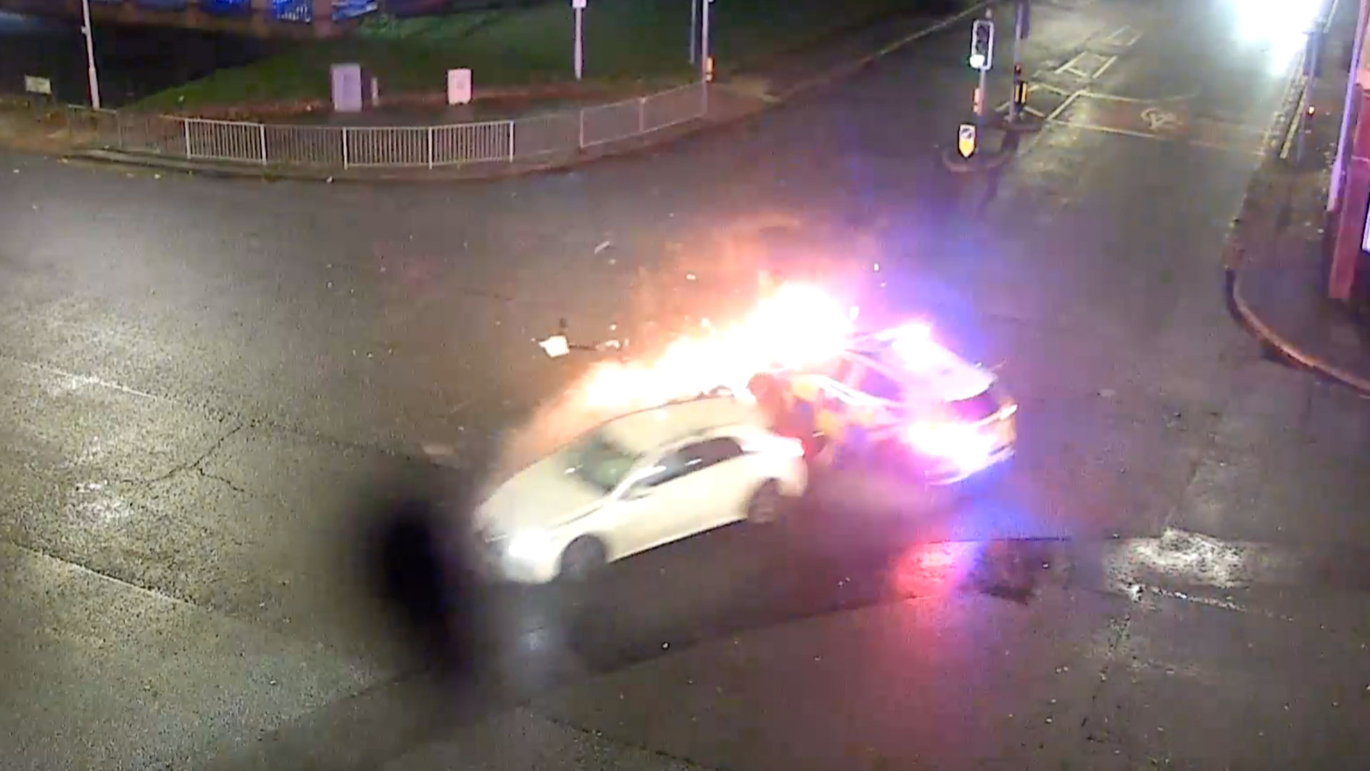 Mother Crashes Into Police Car, Causing It to Burst Into Flames