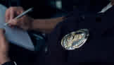 Why Police Officers Tap the Back of Your Car as They Approach Your Window Sometimes